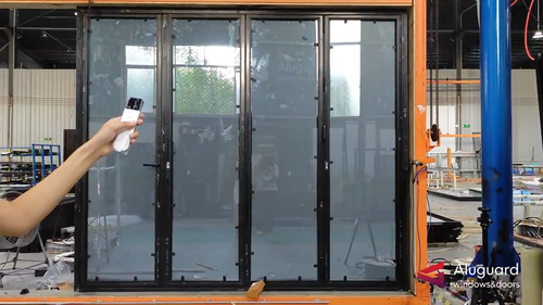  Custom 75 Series Folding Door (1+3 Setup) featuring state-of-the-art Smart PDLC Dimmable Glass.
